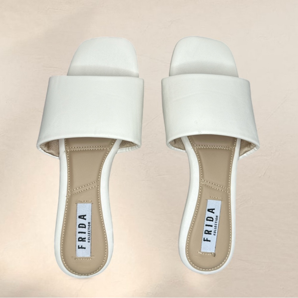 White flat slide sandals